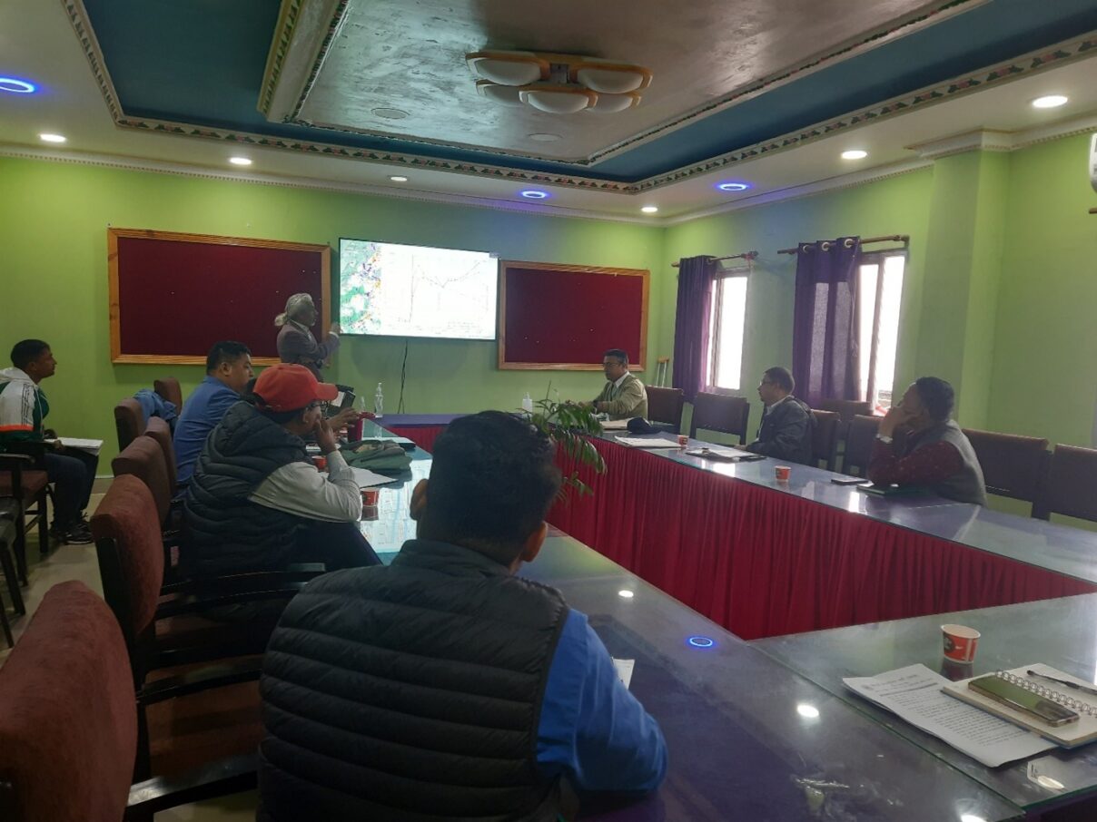 Gopi giving a presentation on the slope monitoring equipment to the municipal disaster management committee members